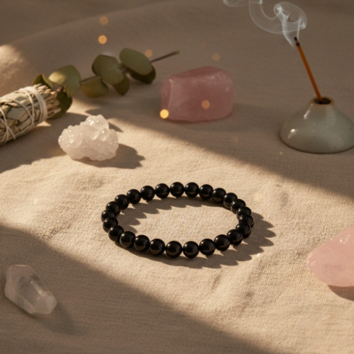 Bracelet en perles d'obsidienne noire à reflets dorés